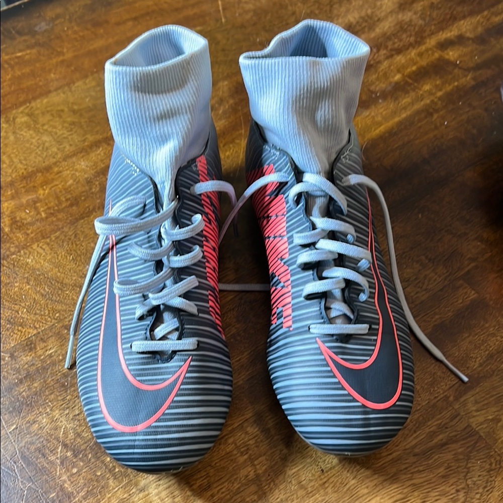 Nike Gray and Pink Soccer shoes with Ribbed Upper